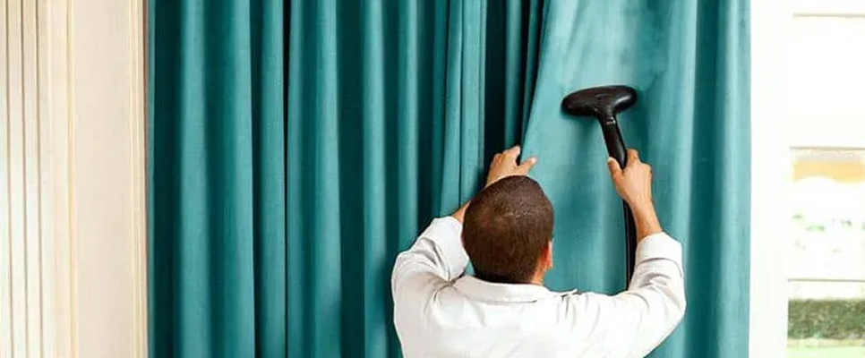 How to Clean Curtains While Hanging